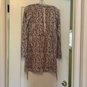 Unique and stylish long-sleeved rash-guard dress.